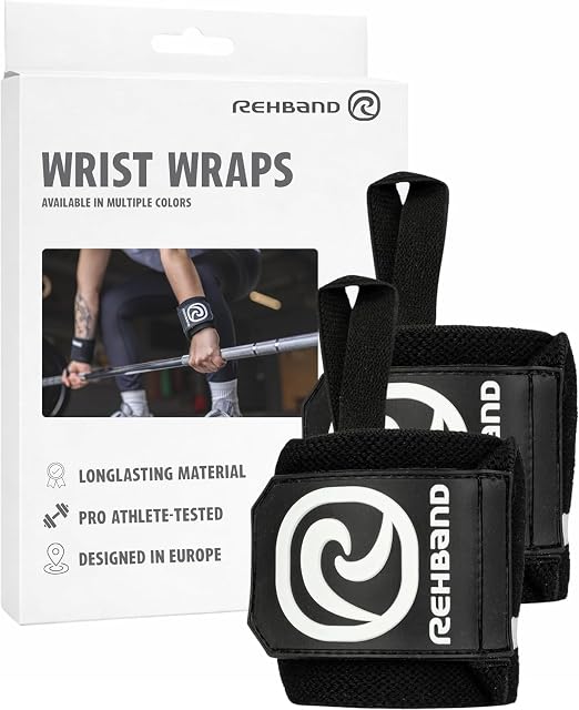 Fasce da polso Rehband nere davanti alla loro scatola, su cui si legge pro athlete-tested e designed in Europe